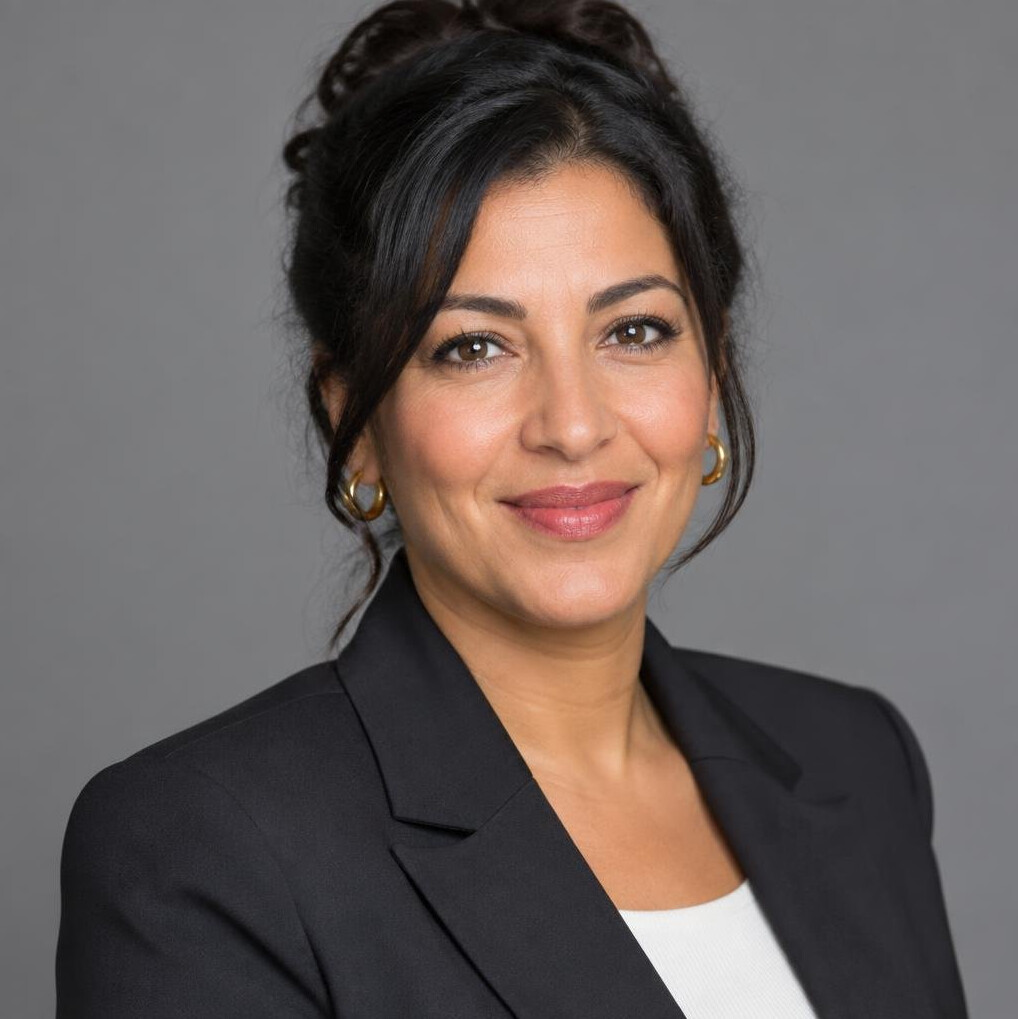 Portrait of a professional North African woman in her 40s smiling